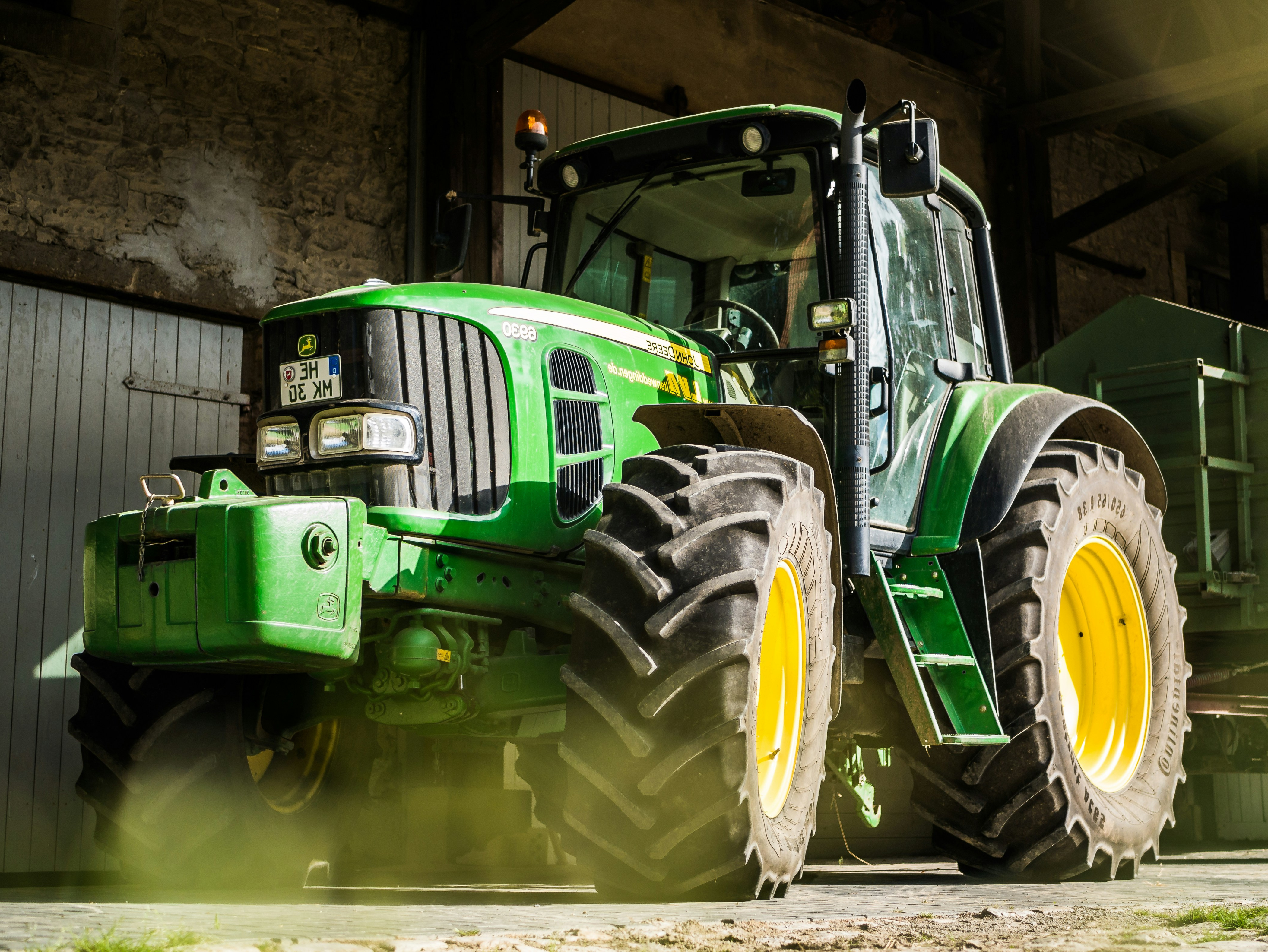 IronHorse tractor cutting across farmland